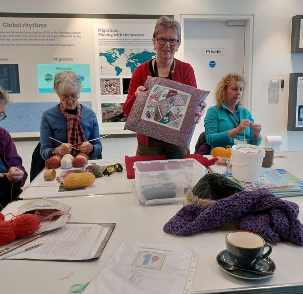 Anne Yates showing cushion created by Anne Wall © Kathy Crowther Anne Yates showing cushion created by Anne Wall © Kathy Crowther