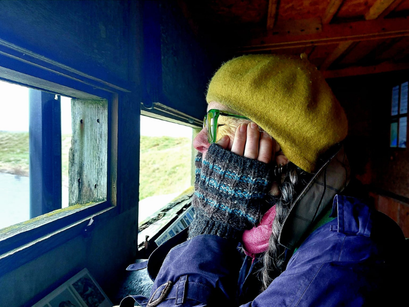 Catherine in a hide © Catherine Farr