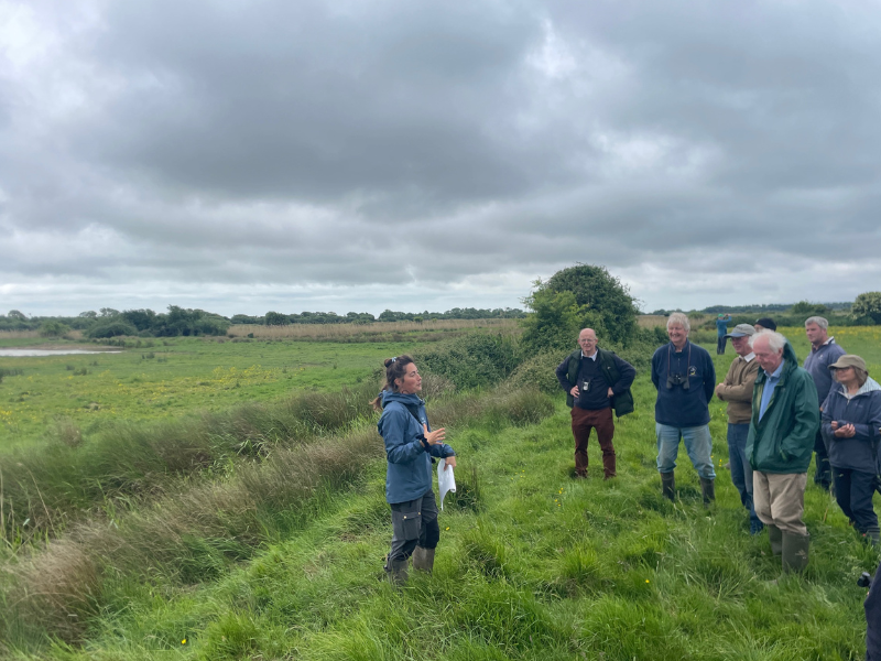 Charlotte Pestell talking to local farmers, May 2025 (c) Charlie Peverett