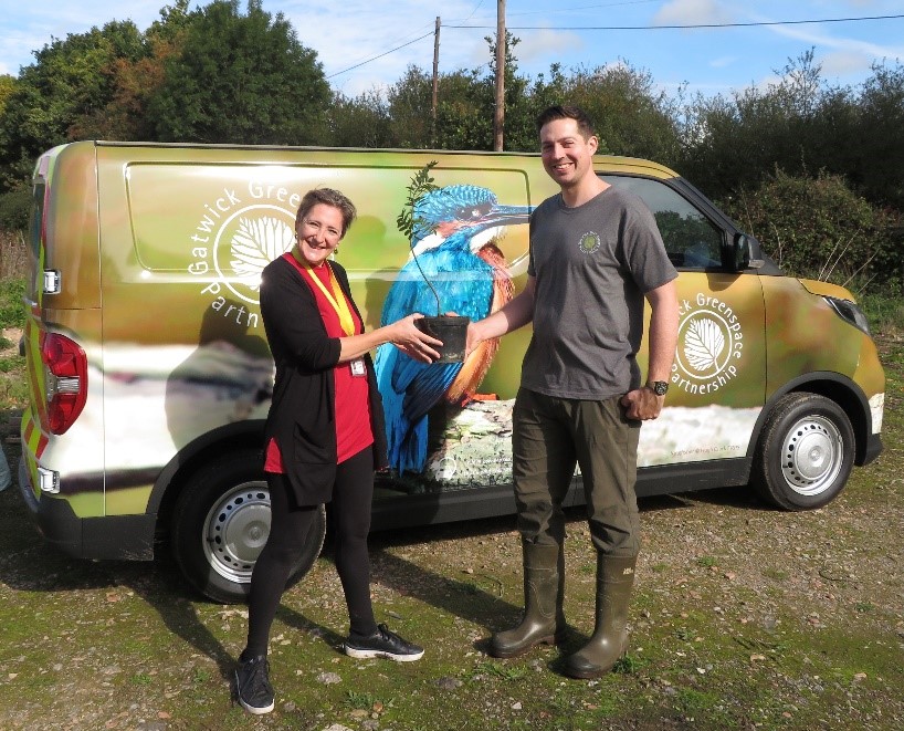 Ryan Greaves (GGP) donating some Rowan trees grown in the Youth Rangers Wildlife Garden to Nicky Bagilhole (NCS)