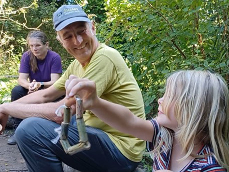 Making an elder bead bracelet with Mike Murphy, Communities & Wildlife Training Officer © Sarah Watson